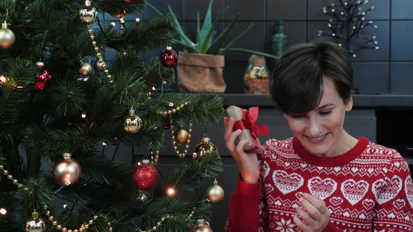 Female holds present for Christmas and New Year