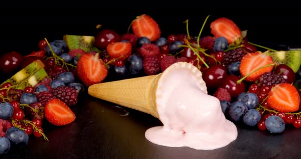 Fruit Ice Cream Melting on Black Table