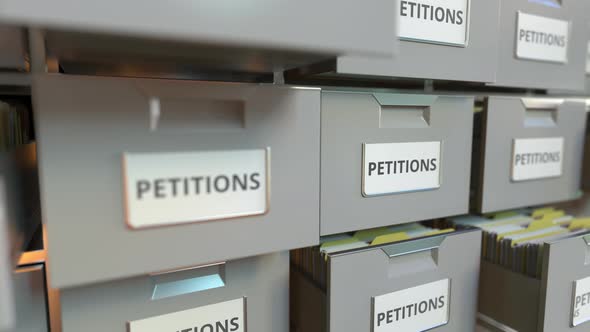 PETITIONS Text on the Drawers of a File Cabinet