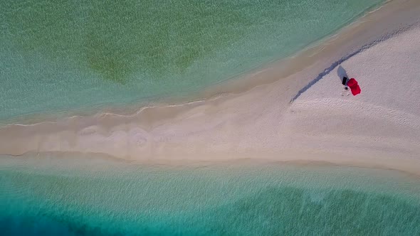 Close up tourism of marine island beach adventure by shallow ocean