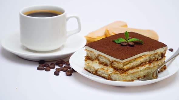 Tiramisu Dessert Square Portion, Savoiardi Cookies and Cup of Coffee Isolated on White Background