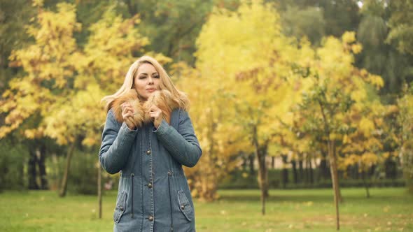 Lady Wearing Stylish Coat Freezing While Waiting for Boyfriend, Autumn Scene