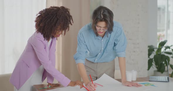 Business partners are working on an architectural project Home office Coffee at work Workspace