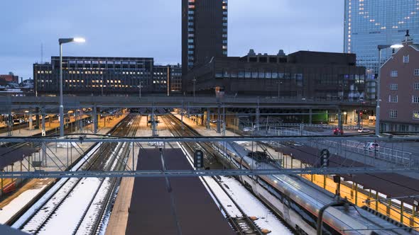 Train Arriving At Oslo Central Station Near Sopra Steria Building From Acrobat Bridge At Night In Os