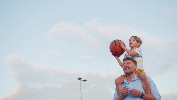 Little boy with dad outdoors