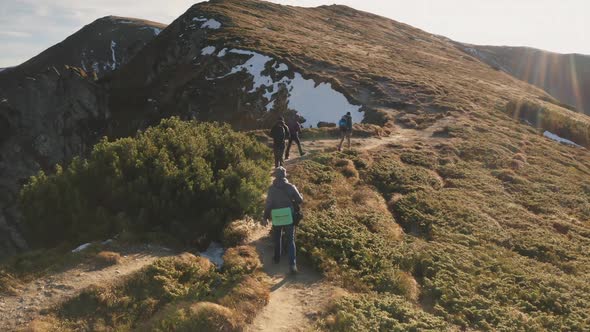 Travelers Hiking at Mountain Path Aerial