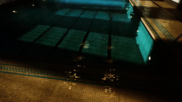The View of an Empty Public Swimming Pool Indoors alt