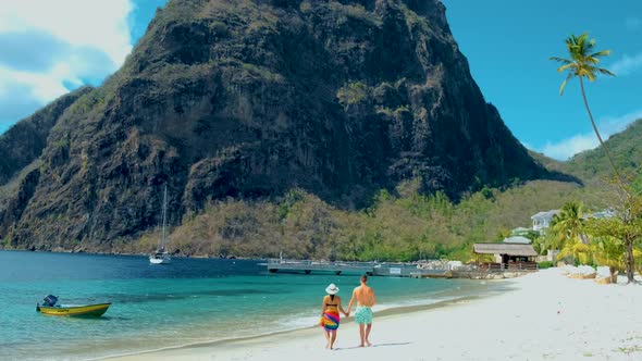 St Lucia Caribbean Couple Men and Women on Vacation Huge Pitons Drone View at Saint Lucia Sugar