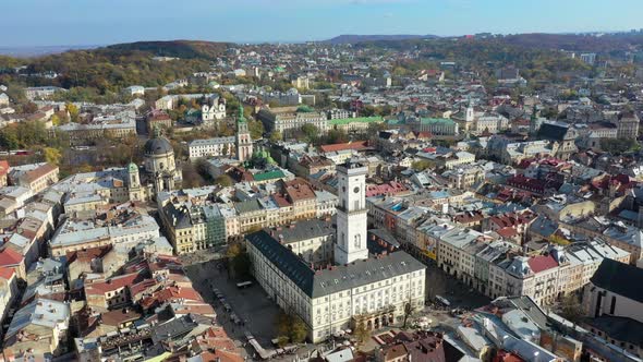 Aerial Drone Video of Lviv Old City Center - Roofs and Streets, City Hall Ratusha