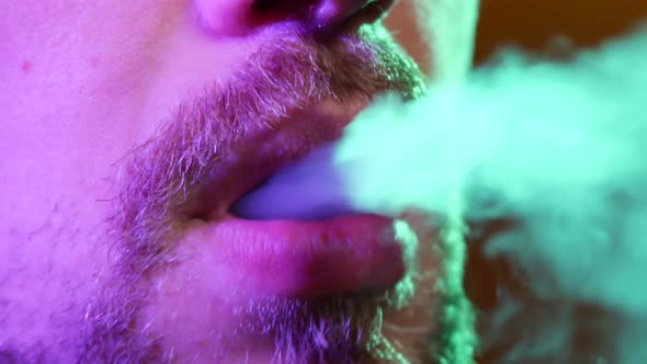 The Mouth of a Man Smoking the Traditional Hubble-bubble or Hookah.