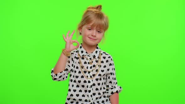 Child Kid Girl Looking Approvingly at Camera Showing Ok Gesture Like Sign Positive Something Good