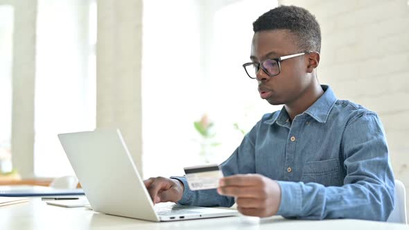 Online Payment Failure on Laptop By Young African Man