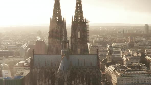 AERIAL: Towards Cologne Cathedral and TV Tower in Beautiful Hazy Sunlight with Rain 