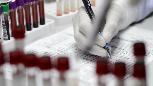 Scientist testing in laboratory.