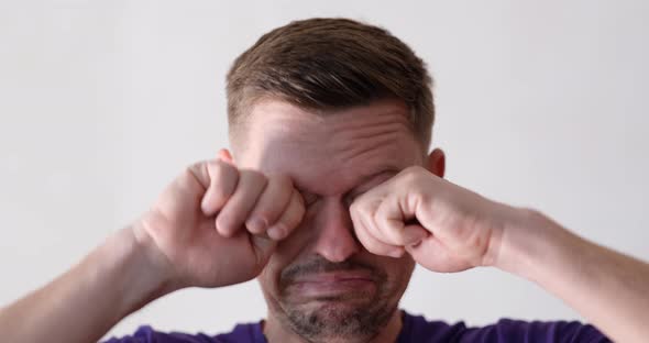 Young Crazy Man Wiping Tears with His Hands and Screaming  Movie