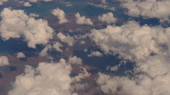 Big Clouds and Sky View From the Plane the Plane Flies High in the Sky Above the Clouds