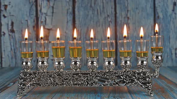 Olive oil candles with orthodox jewish light a hanukkah menorah