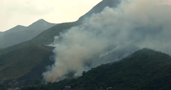 Mountain fire accident with helicopter rescue 