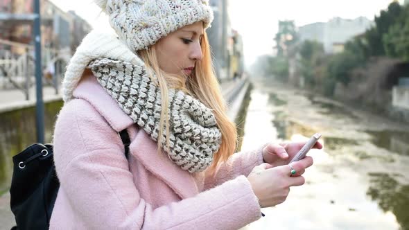 Young woman using smartphone