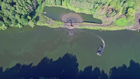 Excavation and Removal of Soil From the Bottom of the Reservoir