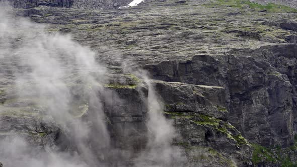 Mist Rising From Rocky Cliffs