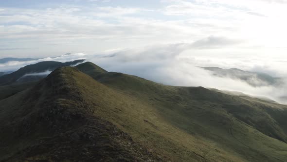 Aerial View of mountains in the clouds, Maluti A Phofung NU, Free, South Africa.