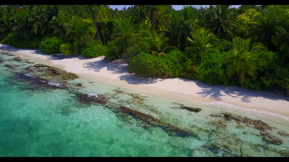 Aerial nature of idyllic sea view beach vacation by shallow lagoon and white sand background of a da