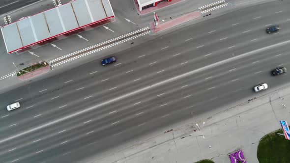 Overhead Aerial Diagonal Cars Driving in Novosibirsk City Traffic