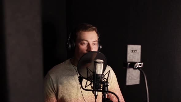 A Professional Announcer Makes a Recording in the Studio