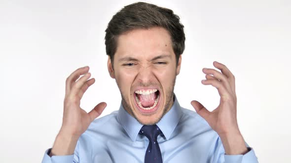 Screaming Young Businessman going Crazy on White Background