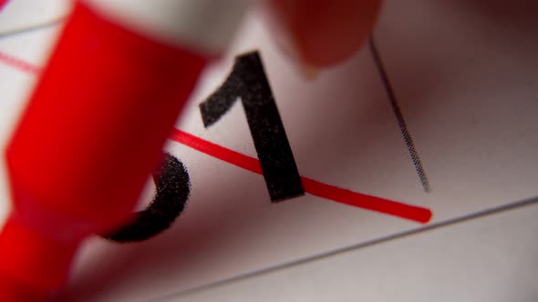The 31St Number in the Calendar is Crossed Out with a Red Cross in a Macro on a White Sheet