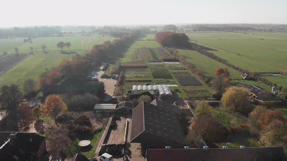 Overview of a biological dynamic farm in The Netherlands showing the diversity of its barns and crop