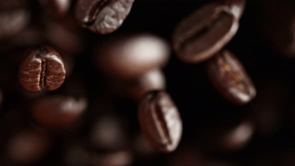 Super Slow Motion Shot of Exploding Premium Coffee Beans Towards the Camera at 1000Fps