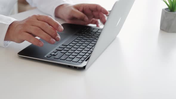 Online Medical Research Doctor Hands Typing Laptop