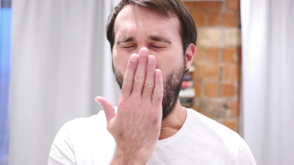 Tired Beard Man Yawning in Office Indoor
