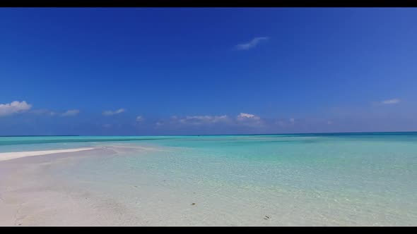 Aerial scenery of perfect seashore beach holiday by turquoise sea and white sand background of a day