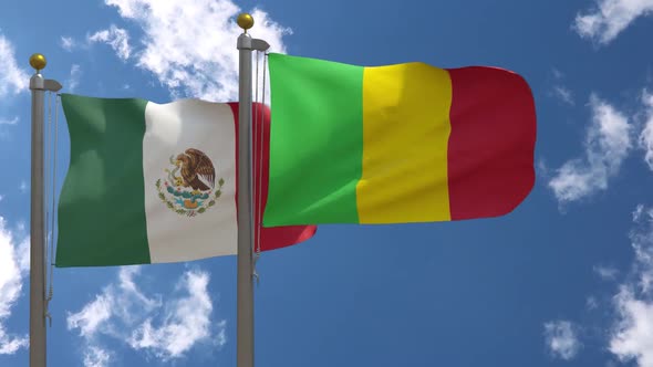 Mexico Flag Vs Mali Flag On Flagpole