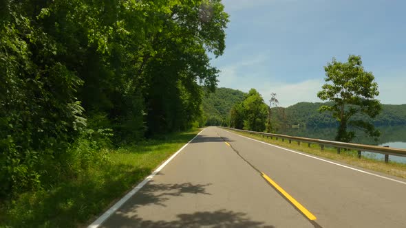 Rear View Scenic Road In Tennessee Usa By A River