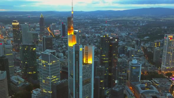 AERIAL: View of Frankfurt Am Main, Germany Skyline at Night,City Lights, Traffic,Movement