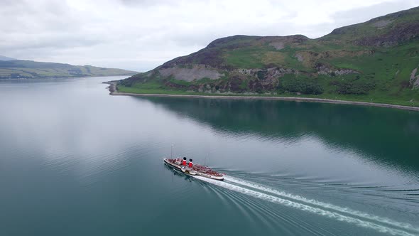 A Paddle Steamer Taking Tourists on a Sea Tour