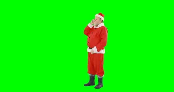 Santa claus talking on mobile phone 4k