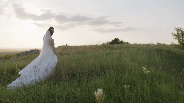 Back Side View of Bride and Groom That Walking Together