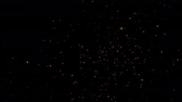 Super Slow Motion Shot of Golden Glittering Particles Isolated on Black Background at 1000 Fps