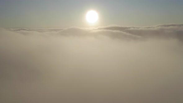 Time Lapse Flying Through Beautiful Cloudscape on Sunrise.  B Roll of Skies