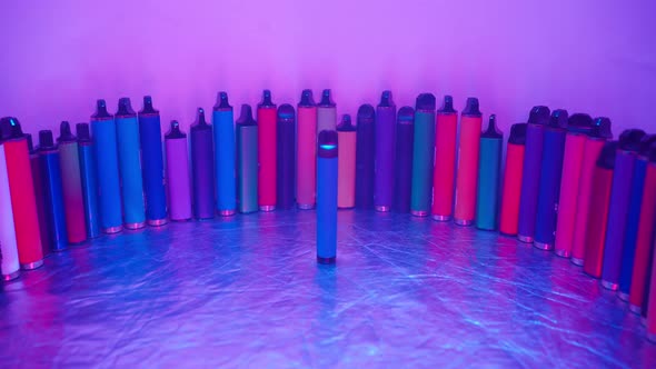 Lots Ecigarettes and Vapes in Neon Lighting