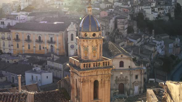 Ragusa Ibla, Sicily, Italy. Maiolica Roofed Bell Tower of Santa Maria dell'Itria Church at Sunset