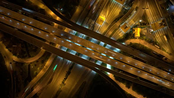 drone flying over interchange and motorway road