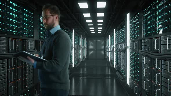 Server Room With System Administrator Man