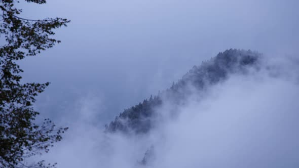 Misty mountain peak in fall