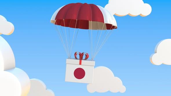 Carton with Flag of Japan Falls with a Parachute